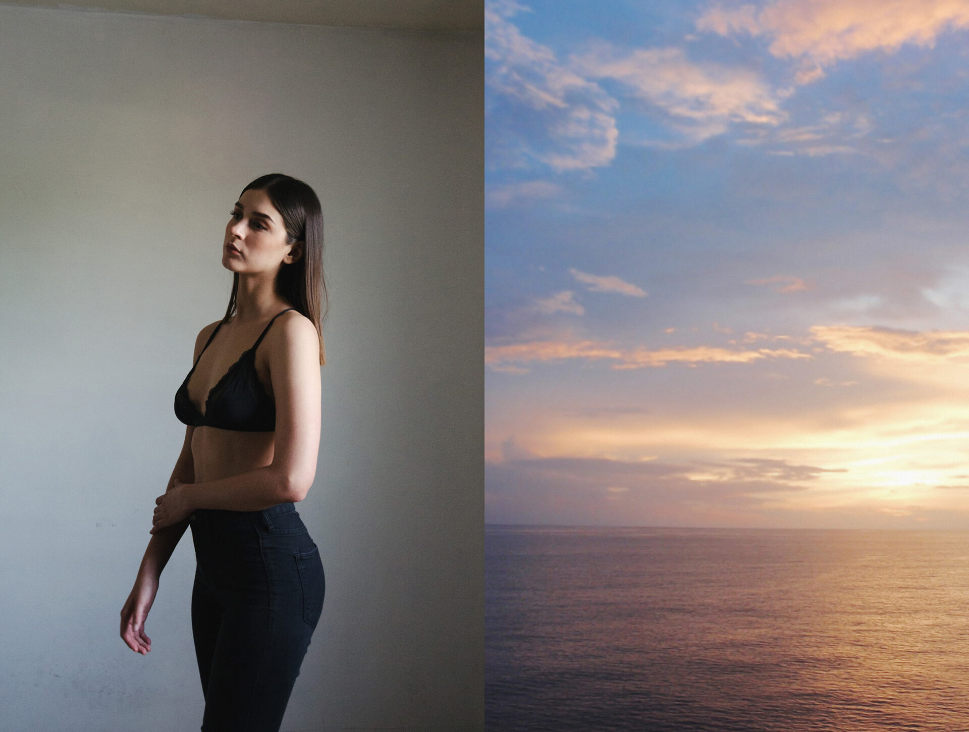 Cassandra Villareal stands against a plain wall her gaze directed upwards while on the right a serene sunset over the ocean paints the sky in hues of pink orange and blue.